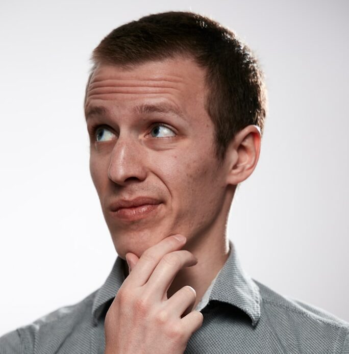 man in gray button up shirt
